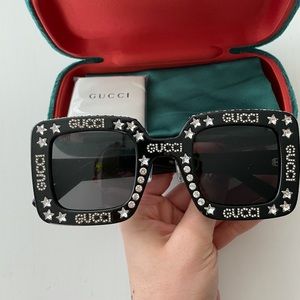 Gg0780s black crystal black lens